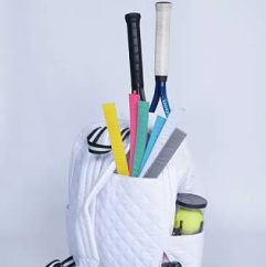 White Sassy Li bag loaded with rackets and balls